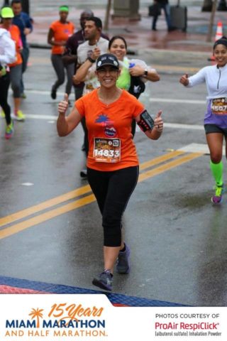 Miami Marathon Runner enjoys the Xpresso Band and DJ P-LO